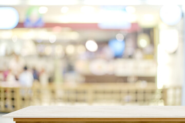 Empty marble top table and blurred cafe background. for Procuct display montage.