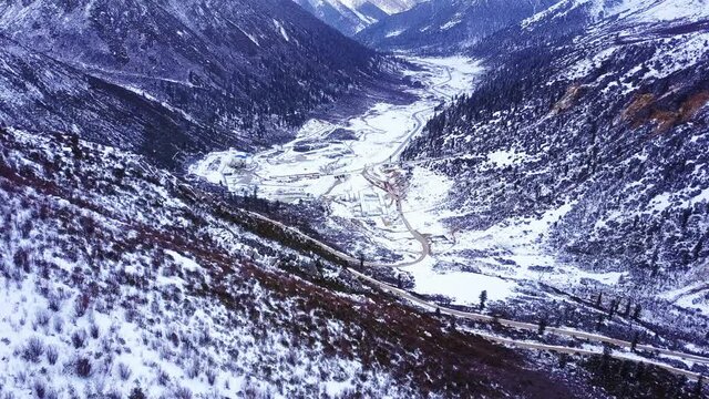 Aerial view of snowy valley of Chola Mountain in Dege Country, Sichuan, China