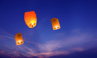 Lanterns in the sky closeup © mbolina