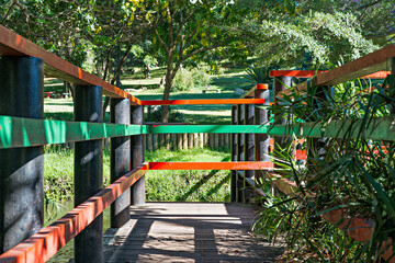 Fototapeta na wymiar Bridge over Lily pond at the Durban North Japanese Gardens, KwaZulu-Natal, South Africa