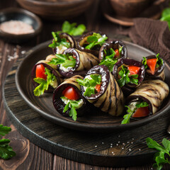 eggplant rolls with garlic feta, tomatoes and herbs