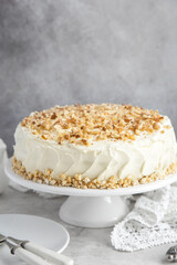 carrot cake with cream cheese frosting and nuts