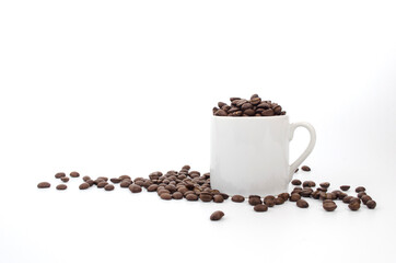 Fototapeta na wymiar coffee beans and white coffee cup on white background