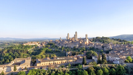 Beautiful sunset aerial view of San Gimignano, small medieval town of Tuscany - Italy