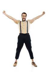 cheerful african american man wearing in suspenders and bow tie yelling and celebrating success isolated on white