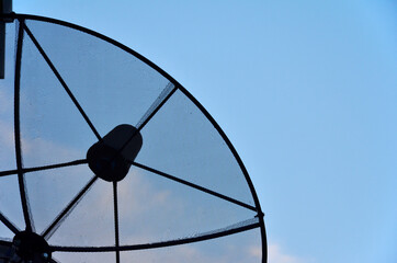 Satellite dish with evening sky./Satellite dish and evening-morning light sky for telecom and broadcasting