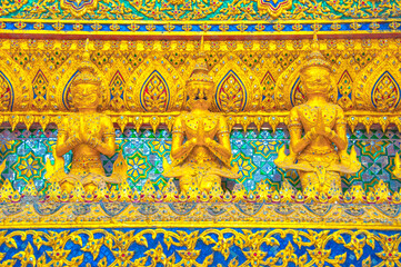 Fototapeta na wymiar The Angel and Garuda Statue with Thai Pattern At Grand palace and Wat phra keaw Bangkok Thailand.