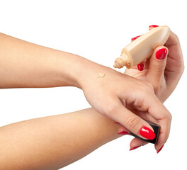 plastic tube for cosmetics in female hand.