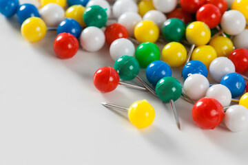 colorful color push pins isolated on white background