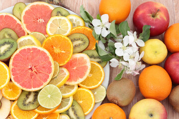 sliced grapefruit ,lemons,kiwi,tangerines and oranges