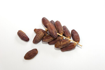dried date palm fruit isolate on white background, ramadan kareem food