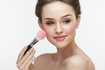 Woman Face Beauty. Sexy Girl Putting Blush With Facial Brush