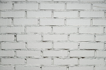 Fototapeta premium White brick wall with copy space