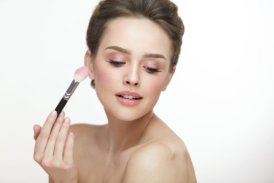 Woman Beauty Makeup. Female With Brush Putting Blush On Skin