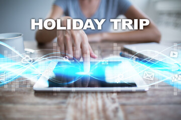 Woman using tablet pc, pressing on virtual screen and selecting holiday trip.