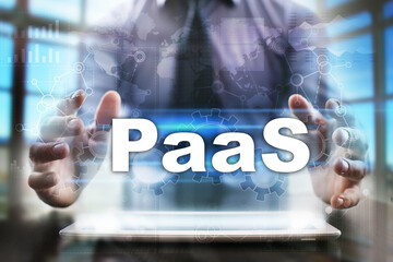 Fototapeta na wymiar Businessman using tablet pc and selecting paas.