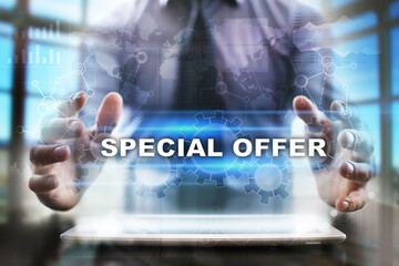 Businessman using tablet pc and selecting special offer.