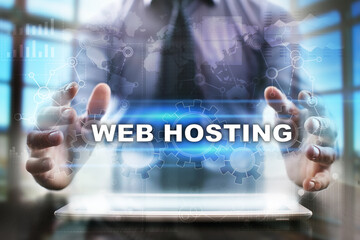 Fototapeta na wymiar Businessman using tablet pc and selecting web hosting.
