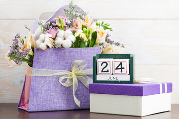 Calendar cubes 24 June Still Life with Flowers and gifts concept day