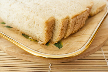Pieces of white bread on a plate