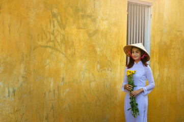 Fototapeta na wymiar Beautiful woman with Vietnam culture traditional dress,traditional costume ,vintage style,Vietnam