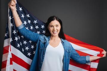 Optimistic confident woman being very patriotic