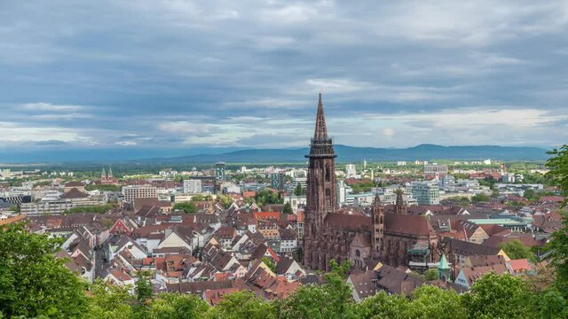 Zoom in time lapse video of Freiburg with Cathedreal on foreground, Germany
