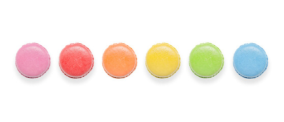 Top view of tasty colorful macaroons on white background.