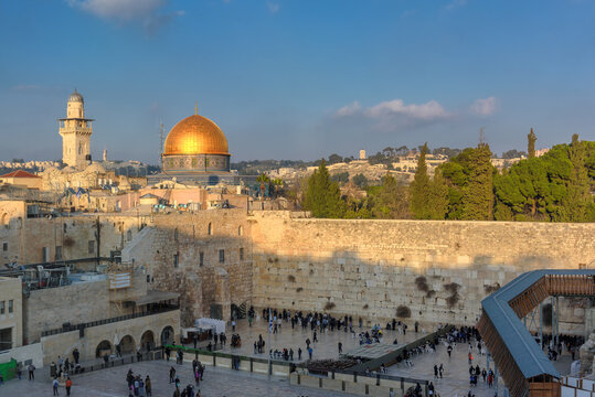 Western Wall and golden Dome of the Rock at sunset in Jerusalem Old City, Israel.