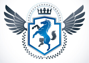 Vintage winged emblem created in vector heraldic design and composed using horse illustration and imperial crown.