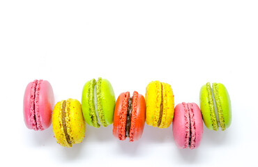 Sweet and colourful french macaroons or macaron on white background