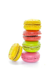 Delicious multicolored macaroons isolated on white.