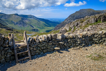 Tryfan is a mountain in the Ogwen Valley, Snowdonia, Wales. It forms part of the Glyderau group,