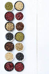 Different beans in bowl for background