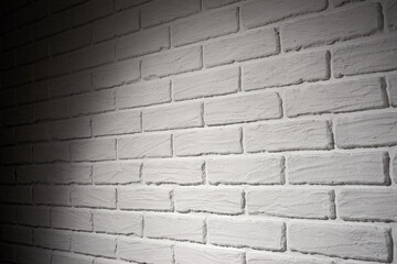 white brick wall with light effect and shadow, abstract background photo, side view