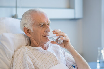 Senior man at hospital - Powered by Adobe