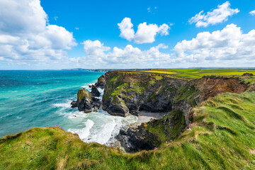 Hell's Mouth, Cornwall, UK. Looking east along the Noth Cliffs towards Portreath. The headland in...
