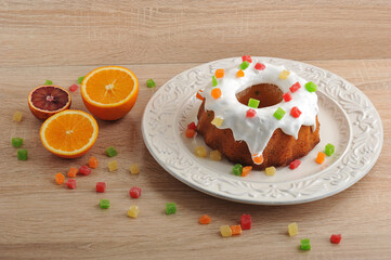Easter cake at Easter with frosting and candied and oranges