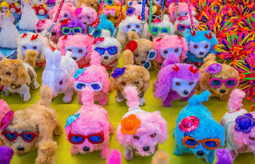 Fototapeta na wymiar Cute dogs dolls on sale at the market