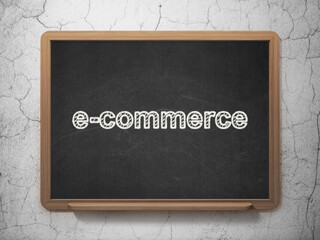 Business concept: E-commerce on chalkboard background