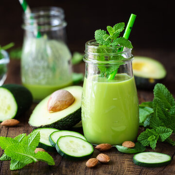 Green Detox Smoothie With Avocado, Cucumber, Spinach And With Fresh Mint. Healthy Eating, Weight Loss And Dieting Concept