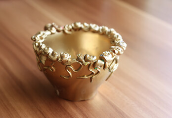 A cup with handmade decoration