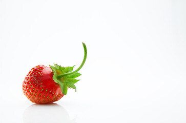 Ripe and juicy strawberries isolated on white background