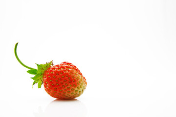 Ripe and juicy strawberries isolated on white background