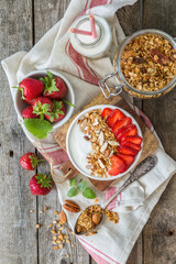 Breakfast - yogurt with granola and straberries