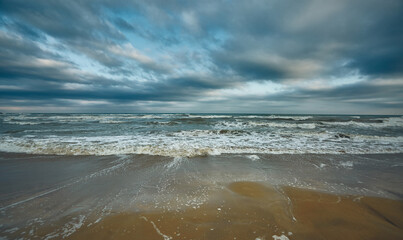 waves on the coast of the Adriatic Sea at sunset