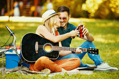  Love Couple  Enjoying Guitar  in the Park Stock photo and 