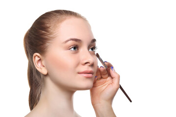 Applying female makeup, isolated on white