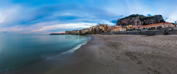 Cefalu, Sicily - Panoramic view of the beautiful Italian town Cefalu at blue hour