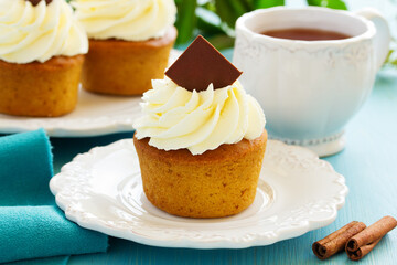 Pumpkin muffins with cream.